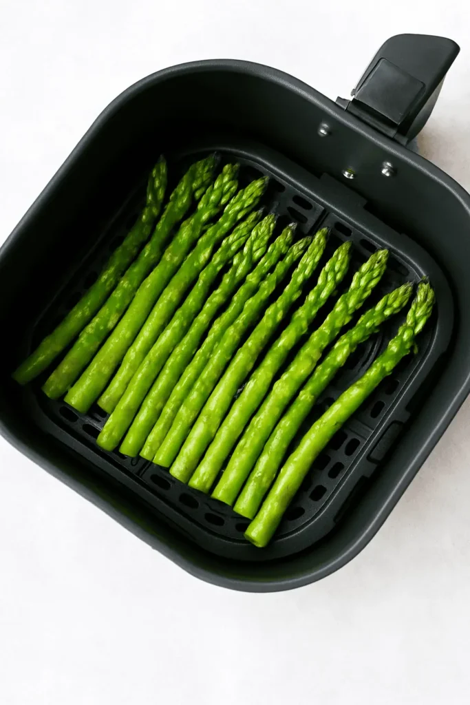 Place asparagus in a single layer in the basket.